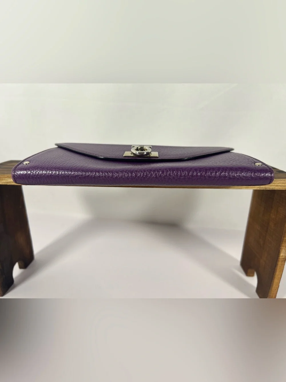 1039: Salvatore Ferragamo Gancini Continental Wallet Purple Leather